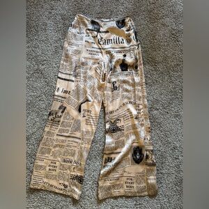 Camilla Tan Newspaper Print Silk Pants.